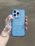 Elevated Faith Christian iPhone Case in blue featuring 'Fruit of the Spirit' text with a decorative strap