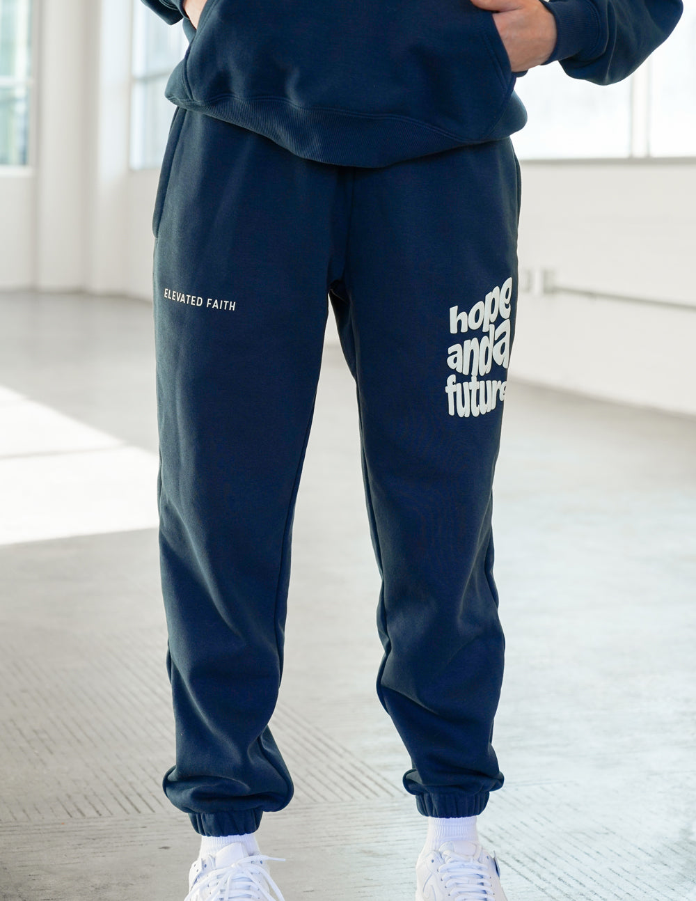 Elevated Faith Navy Sweatpants with Christian Apparel Design featuring 'hope and a future'