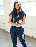 Elevated Faith navy sweatpants featuring inspirational text, perfect for Christian Apparel enthusiasts