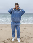 Elevated Faith blue sweatpants and hoodie set from Christian Apparel collection for casual beach wear