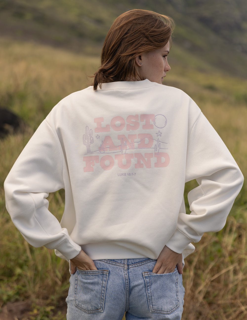 Elevated Faith Christian Crewneck Sweatshirt in cream with Lost and Found graphic design on back