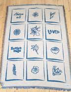 Elevated Faith Christian Gifts Blanket featuring inspirational floral and word designs in blue