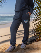 Elevated Faith Sweatpant in navy blue featuring butterfly design, ideal Christian Apparel for comfort and style