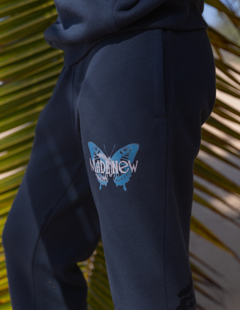 Elevated Faith Sweatpants in Navy with Butterfly Design, a stylish choice for Christian Apparel