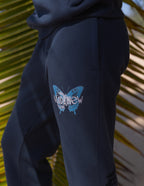 Elevated Faith Sweatpants in Navy with Butterfly Design, a stylish choice for Christian Apparel