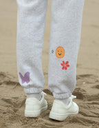 Gray Elevated Faith Sweatpants featuring colorful designs, perfect for casual Christian Apparel wear