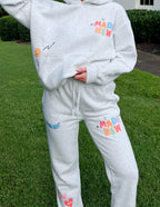 Elevated Faith Made New Sweatpants in Gray featuring colorful graphic designs, perfect for Christian Apparel