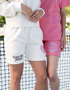 Elevated Faith Christian Shorts in cream and pink featuring stylish graphics for casual comfort