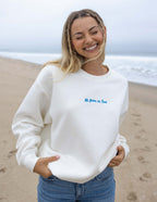 Elevated Faith Christian Crewneck Sweatshirt in Cream with No Fear in Love Design on Beach