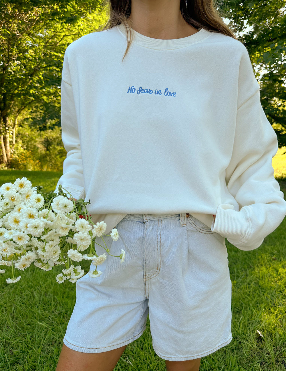 Elevated Faith Christian Crewneck Sweatshirt in white featuring 'NO fear in love' embroidered design