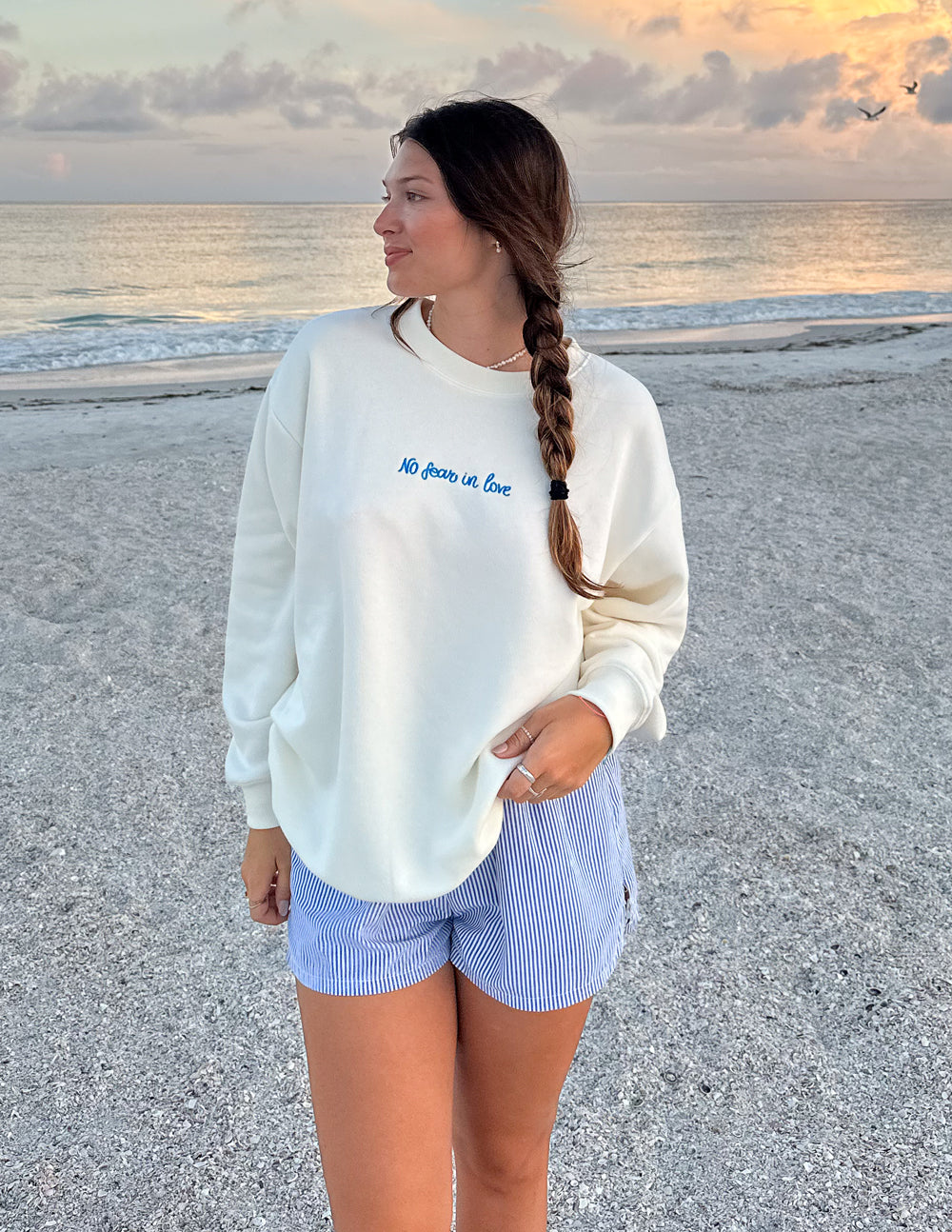 Elevated Faith Christian Crewneck Sweatshirt in cream with No Fear in Love text, perfect for casual wear