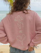Pink Elevated Faith Christian Crewneck Sweatshirt featuring unique ribbon and heart designs