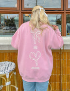 Elevated Faith Christian Crewneck Sweatshirt in pink with unique heart and bow design on the back
