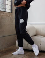 Black Elevated Faith Sweatpants with 'Our God is Bigger Than Jesus' text for Christian Apparel