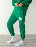 Green Elevated Faith Sweatpants with Christian Apparel design featuring 'Our God is Bigger than Jesus' print