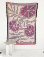 Elevated Faith Woven Blanket featuring floral design and text Peace, ideal for Christian gifts