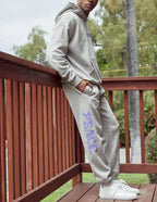 Men's elevated faith sweatpants in gray featuring 'Peace' print, ideal for Christian apparel styling.