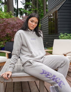 Elevated Faith gray sweatpants featuring PEACE text, perfect for stylish Christian Apparel