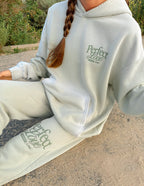 Elevated Faith Sweatpants in Light Green featuring 'Perfect Love' design, part of Christian Apparel collection
