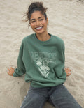 Elevated Faith Christian Crewneck Sweatshirt in green featuring floral design and inspiring message
