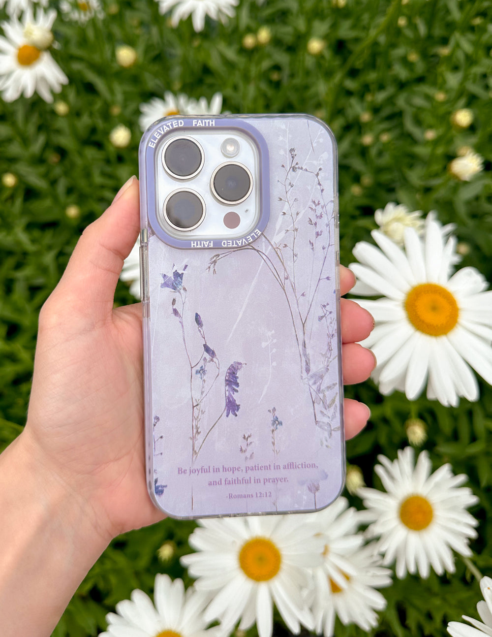 Elevated Faith Christian iPhone Case with Floral Design and Inspirational Quote on a Purple Background