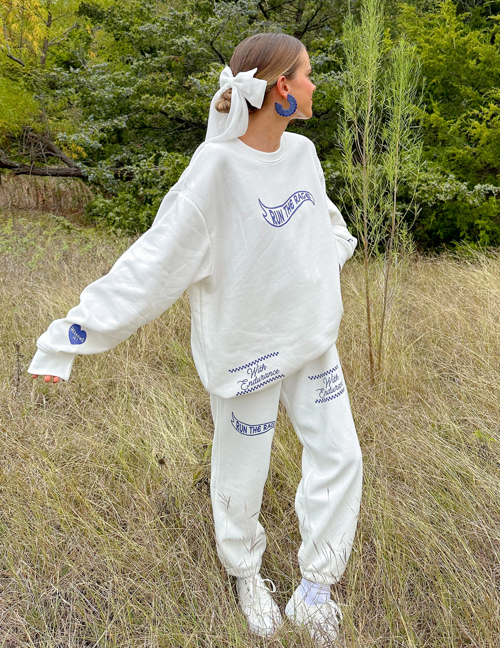 Elevated Faith Christian Crewneck Sweatshirt in white with stylish graphic print and relaxed fit