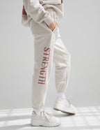 Elevated Faith Sweatpant in Cream with Strength Print, Ideal for Christian Apparel Enthusiasts