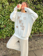 Cozy Elevated Faith Christian Crewneck Sweatshirt in white featuring WWJD design for everyday comfort