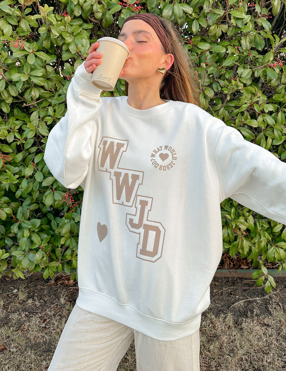 Elevated Faith Christian Crewneck Sweatshirt in White with WWJD graphic and heart design
