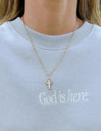 Gold chain necklace featuring a cross pendant, a perfect piece of Christian Jewelry