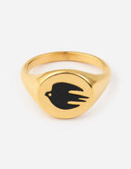 Gold ring featuring a black dove design, perfect for Christian Jewelry enthusiasts