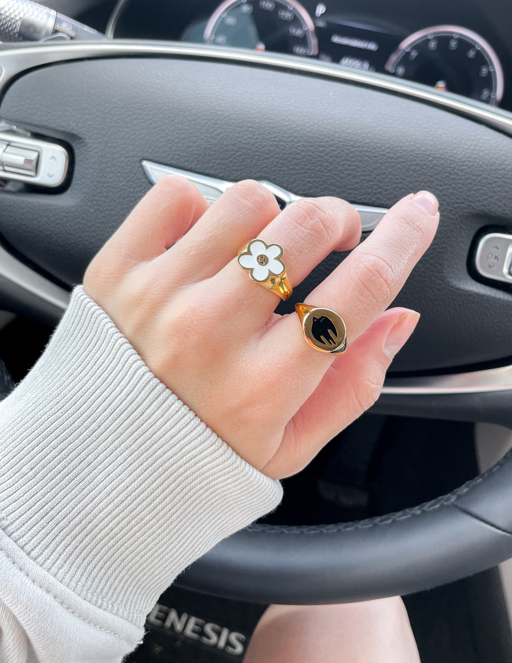 Elevated Faith Christian Jewelry Ring with Flower Design Worn on Hand While Driving