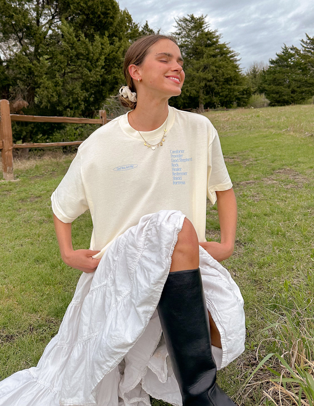 Elevated Faith Christian Apparel T-Shirt in soft cream color featuring inspirational graphics