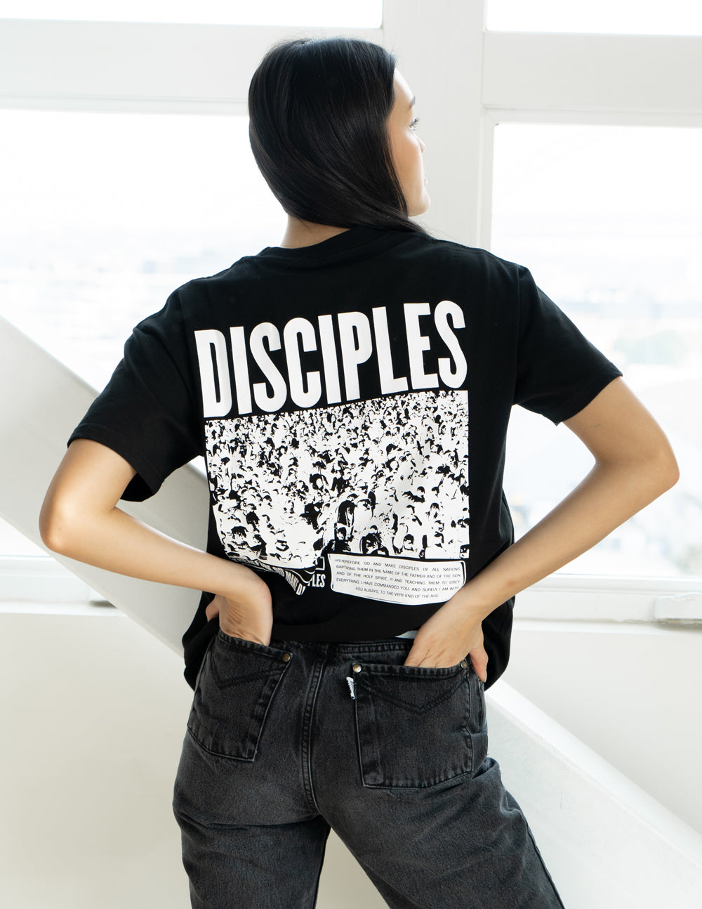 Elevated Faith Christian Apparel T-Shirt featuring a bold 'DISCIPLES' graphic on the back