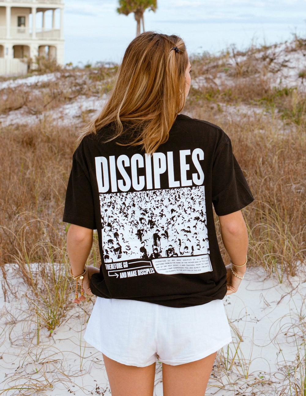 Elevated Faith Christian Apparel T-Shirt in Black featuring Disciples graphic design on the back
