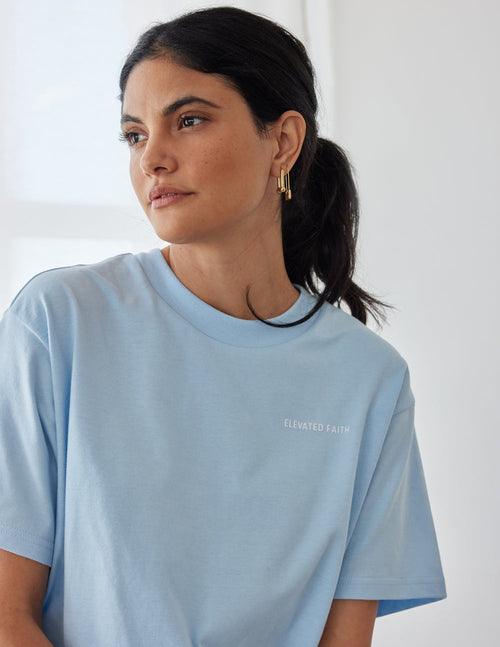 Light blue Elevated Faith Christian Apparel T-Shirt with a relaxed fit and soft fabric