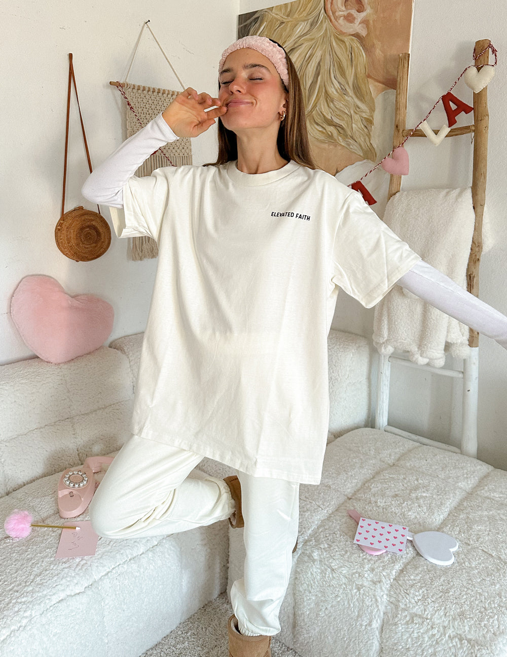 Elevated Faith Christian Apparel T-Shirt in cream color, worn casually for a comfortable look