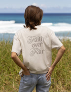 Elevated Faith Christian Apparel T-Shirt with 'Faith over Fear' design on the back