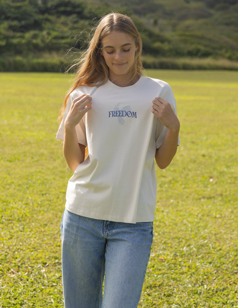 Elevated Faith Christian Apparel T-Shirt in cream with 'FREEDOM' text displayed on the front