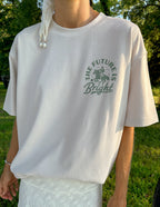 Elevated Faith Christian Apparel T-Shirt featuring 'The Future Is Bright' design in a soft neutral color