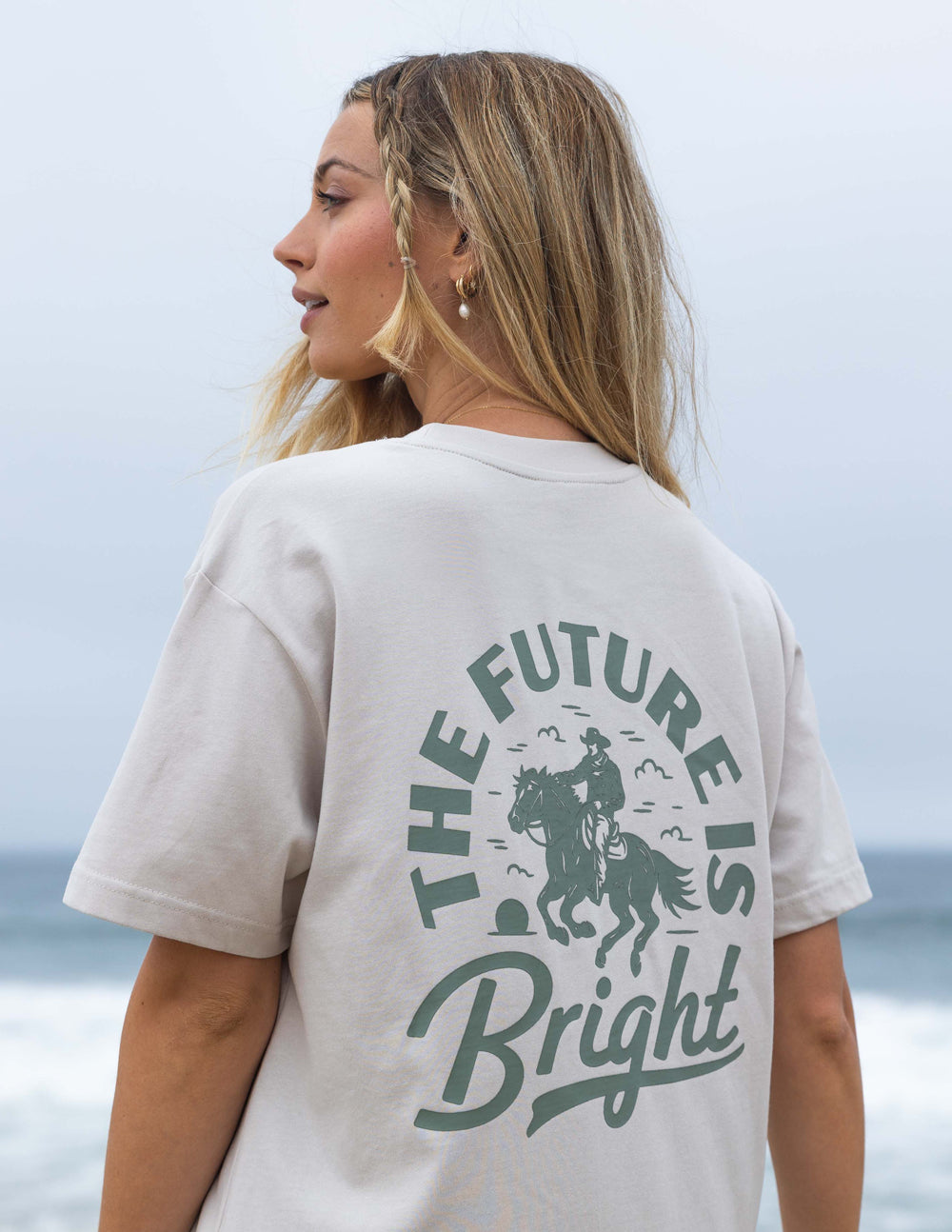 Elevated Faith Christian Apparel T-Shirt featuring a horse graphic and bright message on back