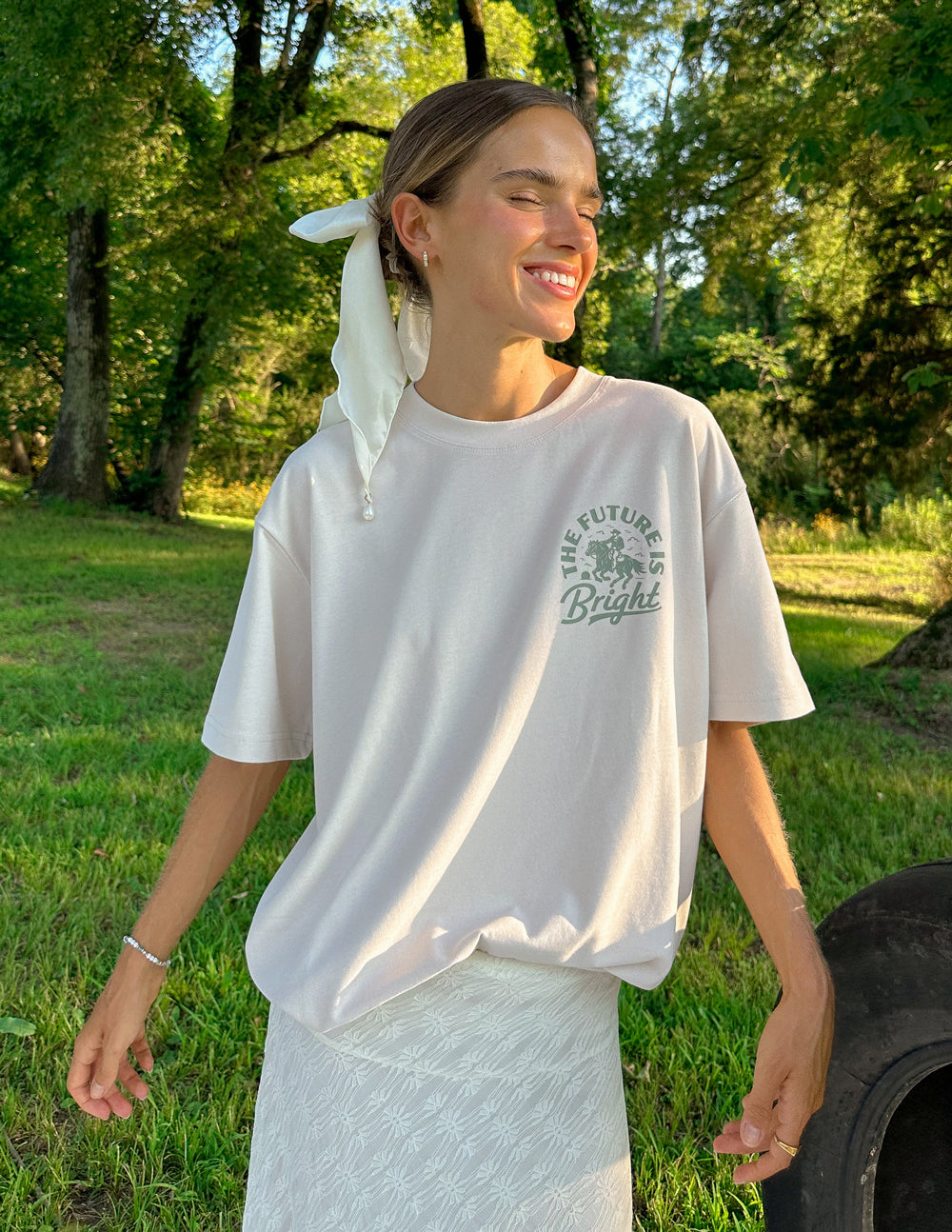 Elevated Faith Christian Apparel T-Shirt in light color with 'The Future is Bright' graphic design