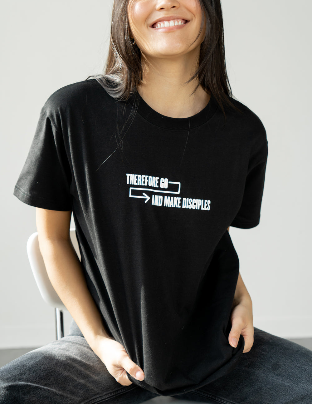 Black Elevated Faith Christian Apparel T-Shirt with the phrase 'Therefore Go and Make Disciples'