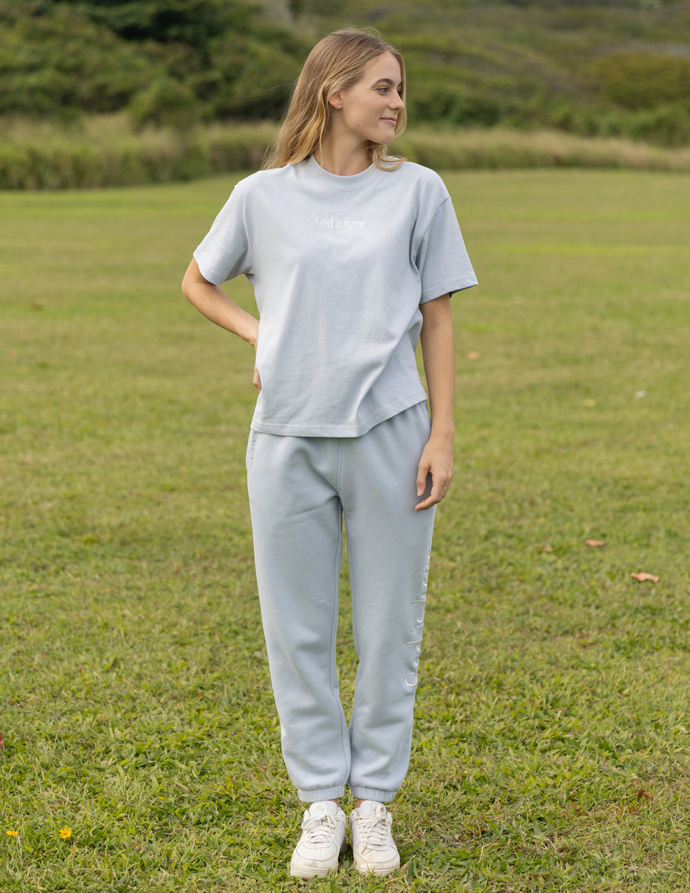 Light blue Elevated Faith Christian Apparel T-Shirt paired with matching sweatpants for a stylish look