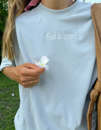 Elevated Faith Christian Apparel T-Shirt in light blue with embroidered 'God is here' design