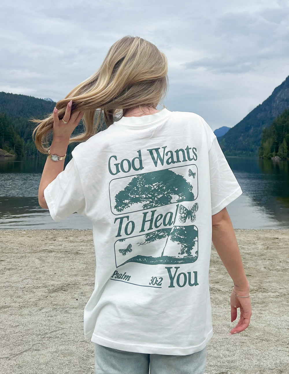Elevated Faith Christian Apparel T-Shirt with 'God Wants To Heal You' graphic in nature setting