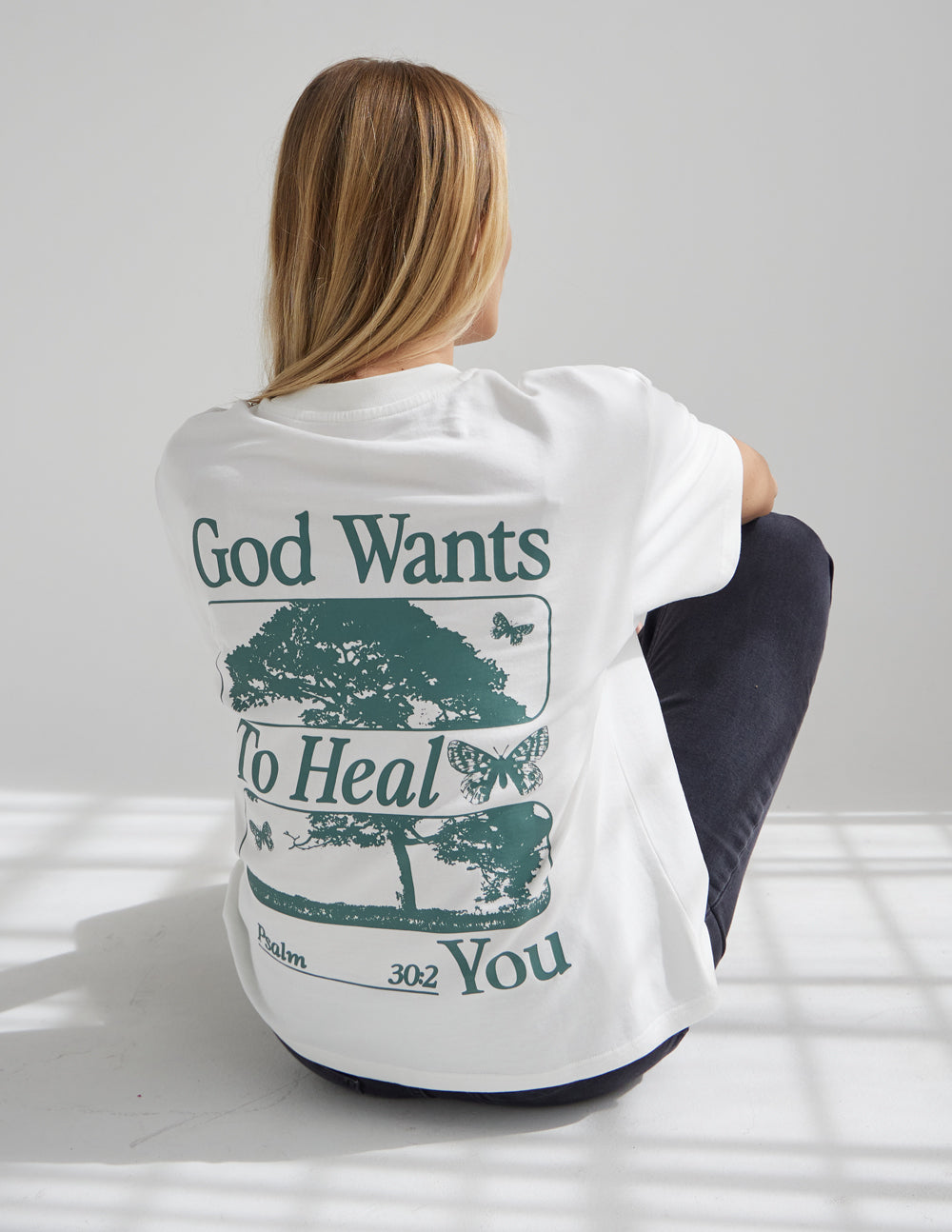 Elevated Faith Christian Apparel T-Shirt featuring a healing message and nature-inspired design