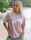 Elevated Faith Christian Apparel T-Shirt in light pink with 'Good News' print for casual comfort