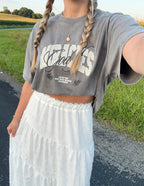 Elevated Faith Christian Apparel T-Shirt in gray, styled with a white skirt for a trendy look