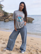 Elevated Faith Christian Apparel T-Shirt featuring a vibrant butterfly design on a gray background